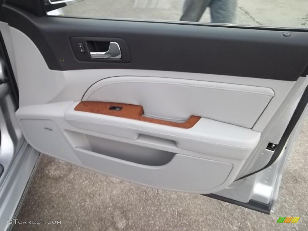 2011 Cadillac STS 4 V6 AWD Light Gray/Ebony Door Panel Photo #46744069