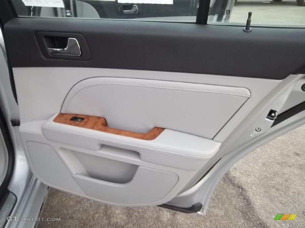 2011 Cadillac STS 4 V6 AWD Light Gray/Ebony Door Panel Photo #46744105