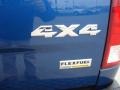 2011 Dodge Ram 1500 ST Quad Cab 4x4 Badge and Logo Photo