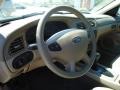 Medium Parchment Steering Wheel Photo for 2003 Ford Taurus #46788651