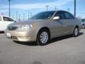 2005 Desert Sand Mica Toyota Camry LE  photo #1