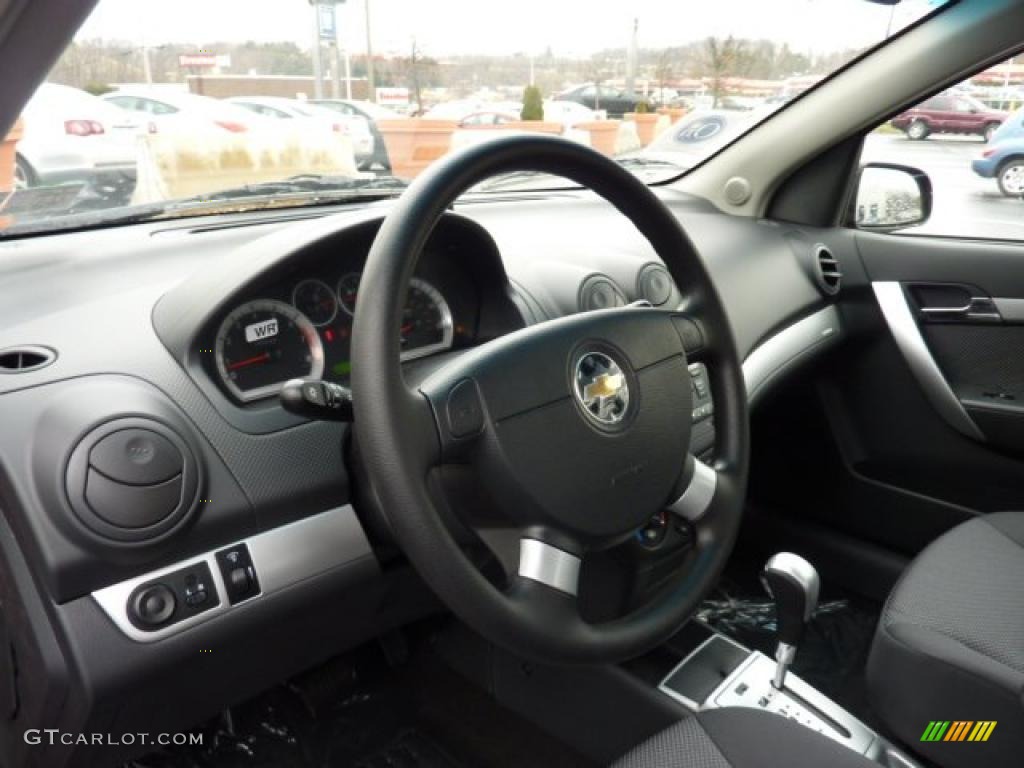 2011 Chevrolet Aveo LT Sedan Charcoal Steering Wheel Photo #46844874