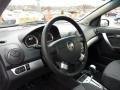Charcoal Steering Wheel Photo for 2011 Chevrolet Aveo #46844874