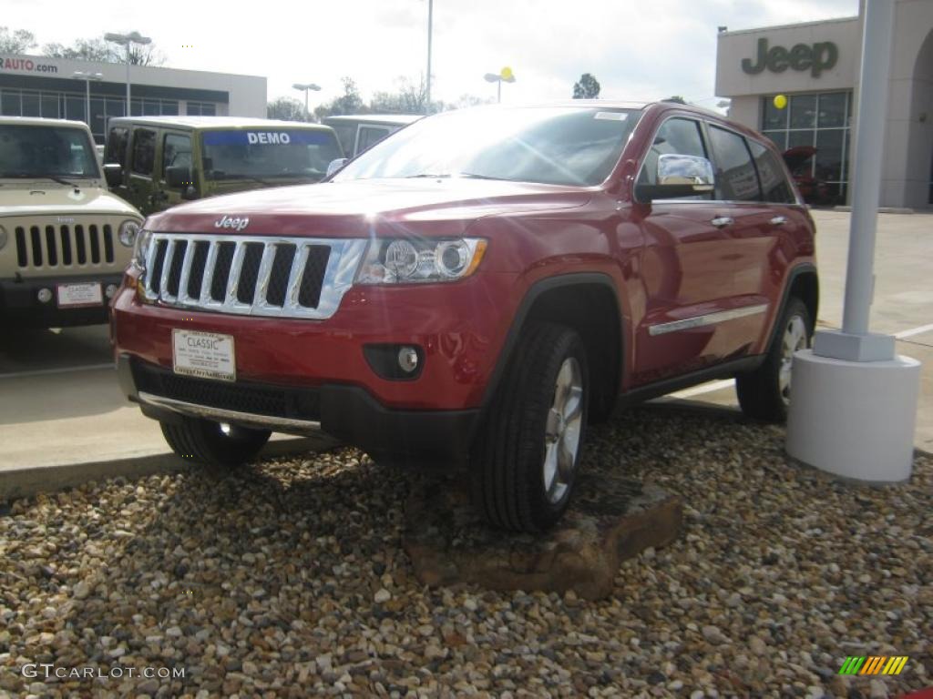 2011 Grand Cherokee Overland 4x4 - Inferno Red Crystal Pearl / Dark Frost Beige/Light Frost Beige photo #1