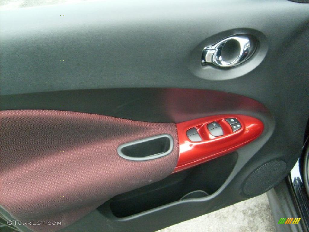 2011 Nissan Juke SV AWD Black/Red w/Red Trim Door Panel Photo #46867932