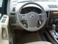 2011 Nissan Titan Almond Interior Steering Wheel Photo