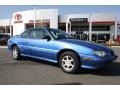 Medium Blue Metallic 1996 Pontiac Grand Am SE Coupe