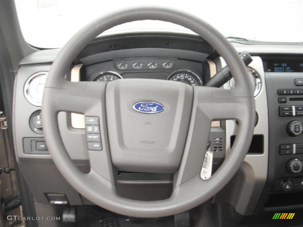 2011 Ford F150 XLT SuperCab Pale Adobe Steering Wheel Photo #46952748