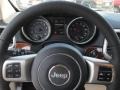 Black/Light Frost Beige 2011 Jeep Grand Cherokee Limited Steering Wheel