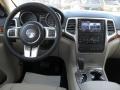 Black/Light Frost Beige Dashboard Photo for 2011 Jeep Grand Cherokee #46953324