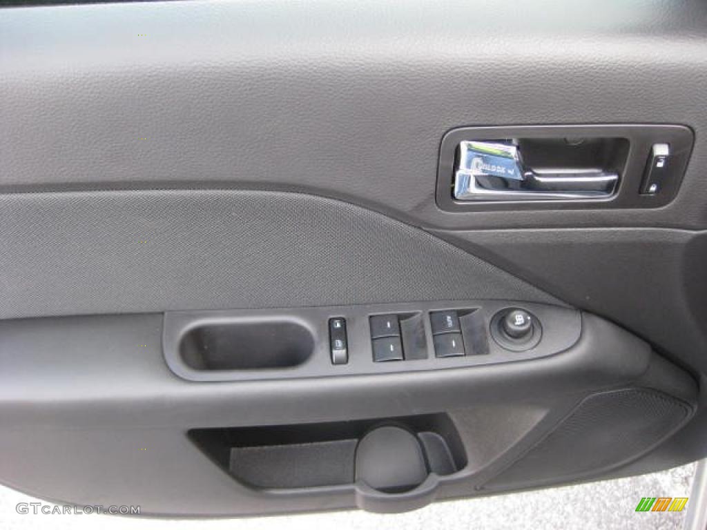 2011 Ford Fusion SE V6 Charcoal Black Door Panel Photo #46960476