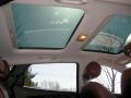 2011 Hyundai Tucson Black/Saddle Interior Sunroof Photo