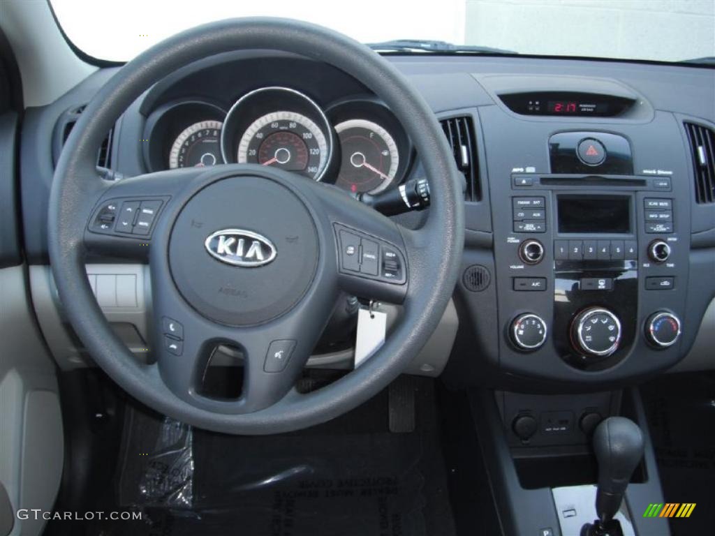 2010 Kia Forte EX Stone Dashboard Photo #46988171