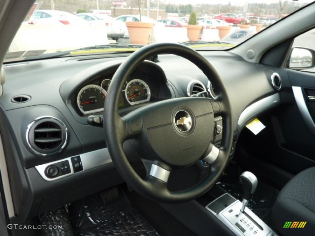 2011 Chevrolet Aveo LT Sedan Charcoal Steering Wheel Photo #47008254