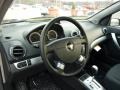 Charcoal Steering Wheel Photo for 2011 Chevrolet Aveo #47008254