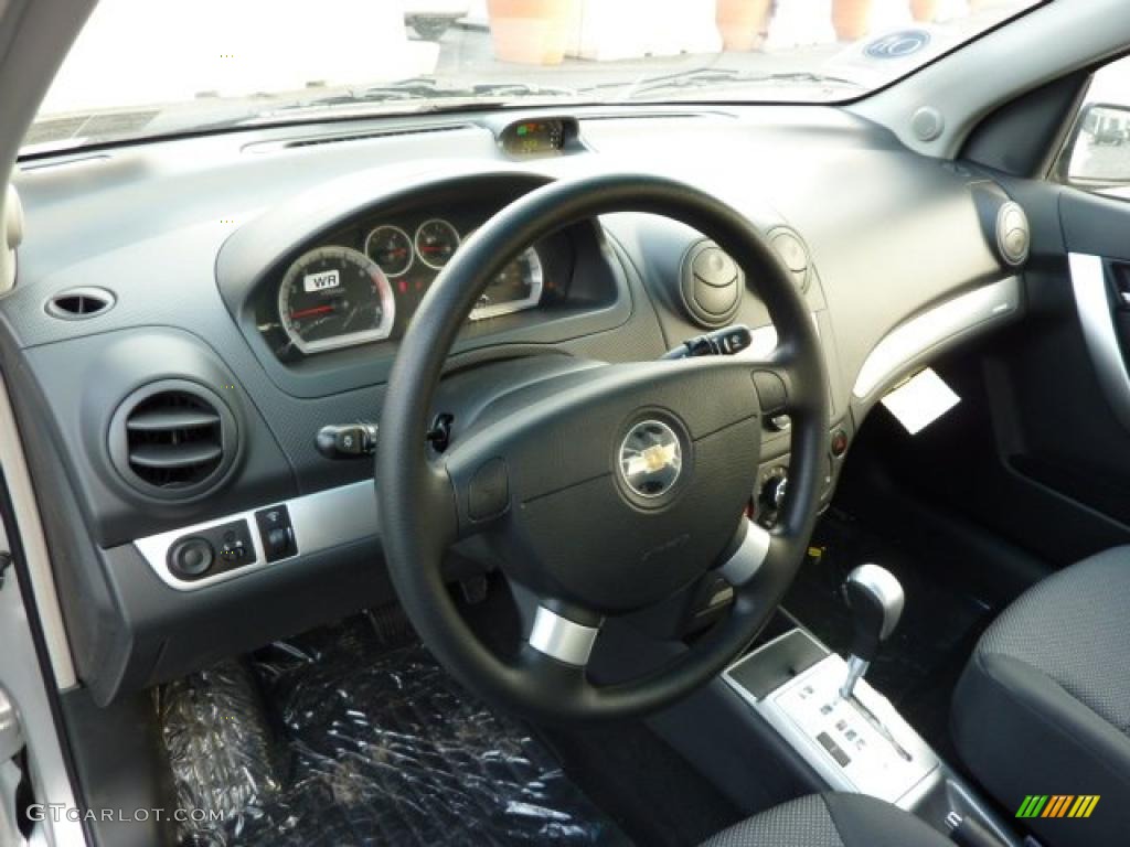 2011 Chevrolet Aveo LT Sedan Charcoal Steering Wheel Photo #47010285