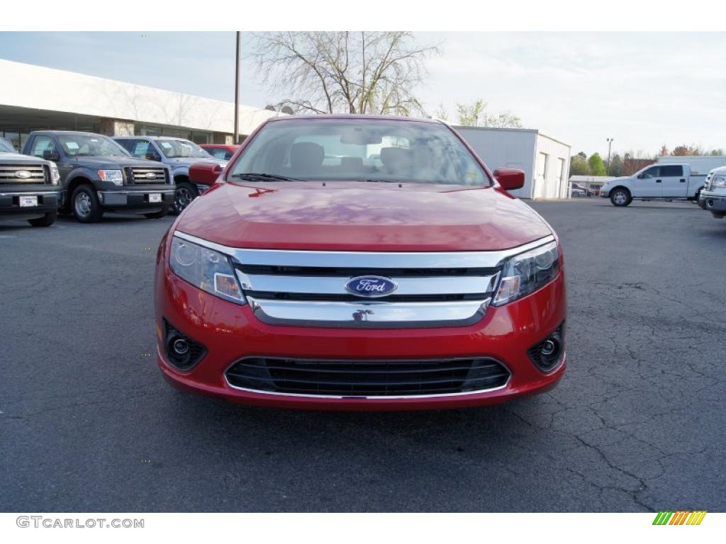 2011 Fusion SE - Red Candy Metallic / Medium Light Stone photo #7