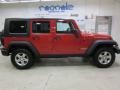 2010 Flame Red Jeep Wrangler Unlimited Rubicon 4x4  photo #4