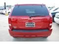 2010 Inferno Red Crystal Pearl Jeep Grand Cherokee Laredo  photo #4