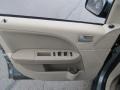 Pebble Beige Door Panel Photo for 2006 Ford Freestyle #47079407