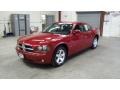 2010 Inferno Red Crystal Pearl Dodge Charger SXT  photo #1