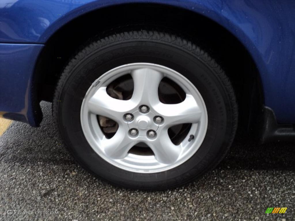 2003 Ford Taurus SE Wheel Photo #47108252