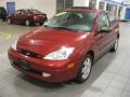 2002 Sangria Red Metallic Ford Focus ZX3 Coupe  photo #2