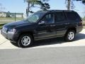 2004 Brillant Black Crystal Pearl Jeep Grand Cherokee Laredo  photo #9