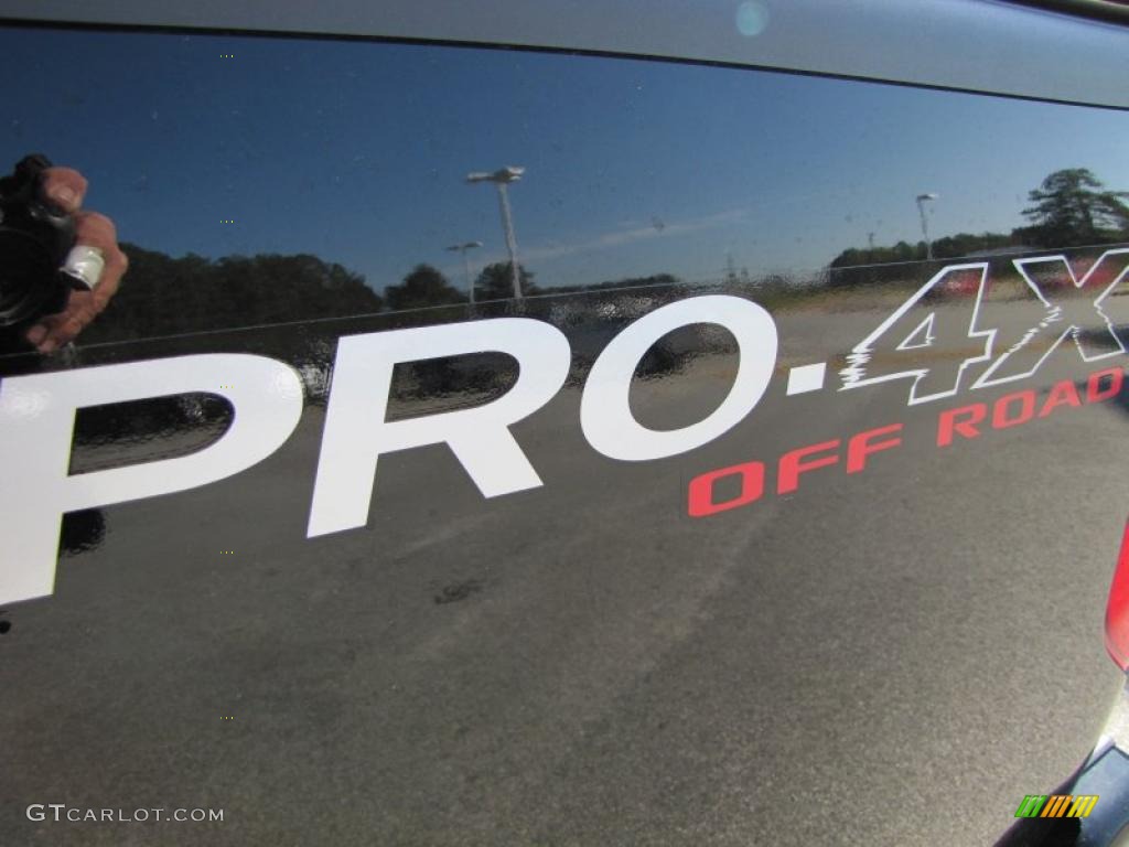 2011 Frontier Pro-4X Crew Cab 4x4 - Super Black / Pro 4X Graphite/Red photo #10