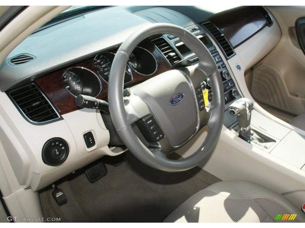 2010 Ford Taurus SEL AWD Light Stone Steering Wheel Photo #47176944