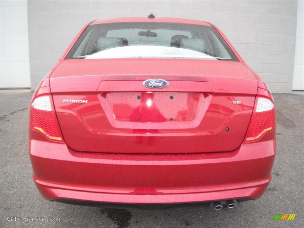 2011 Fusion SE - Red Candy Metallic / Medium Light Stone photo #8