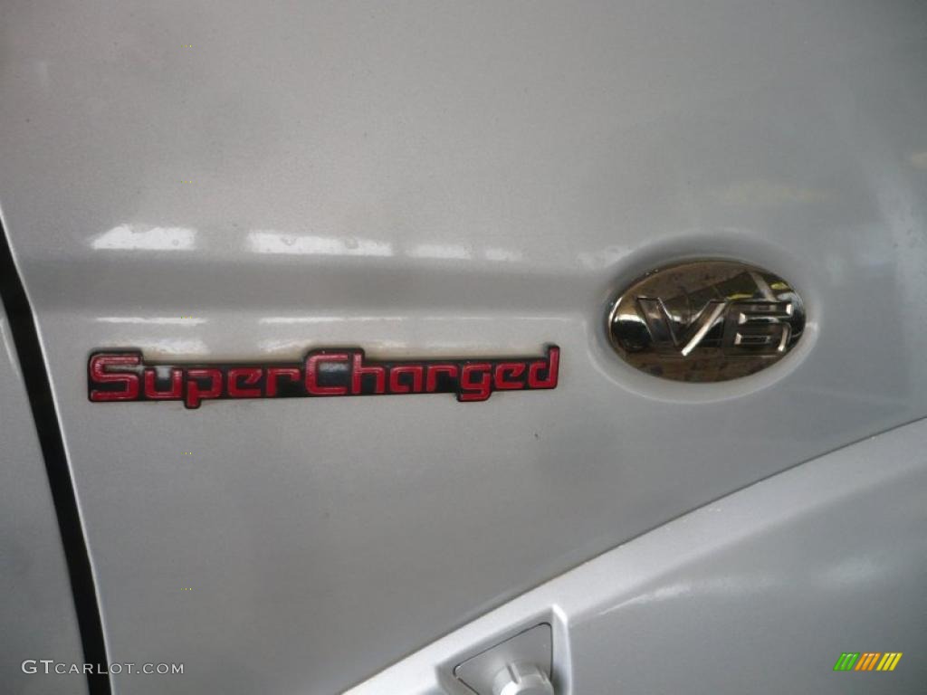 2004 Nissan Frontier SC King Cab 4x4 Marks and Logos Photos