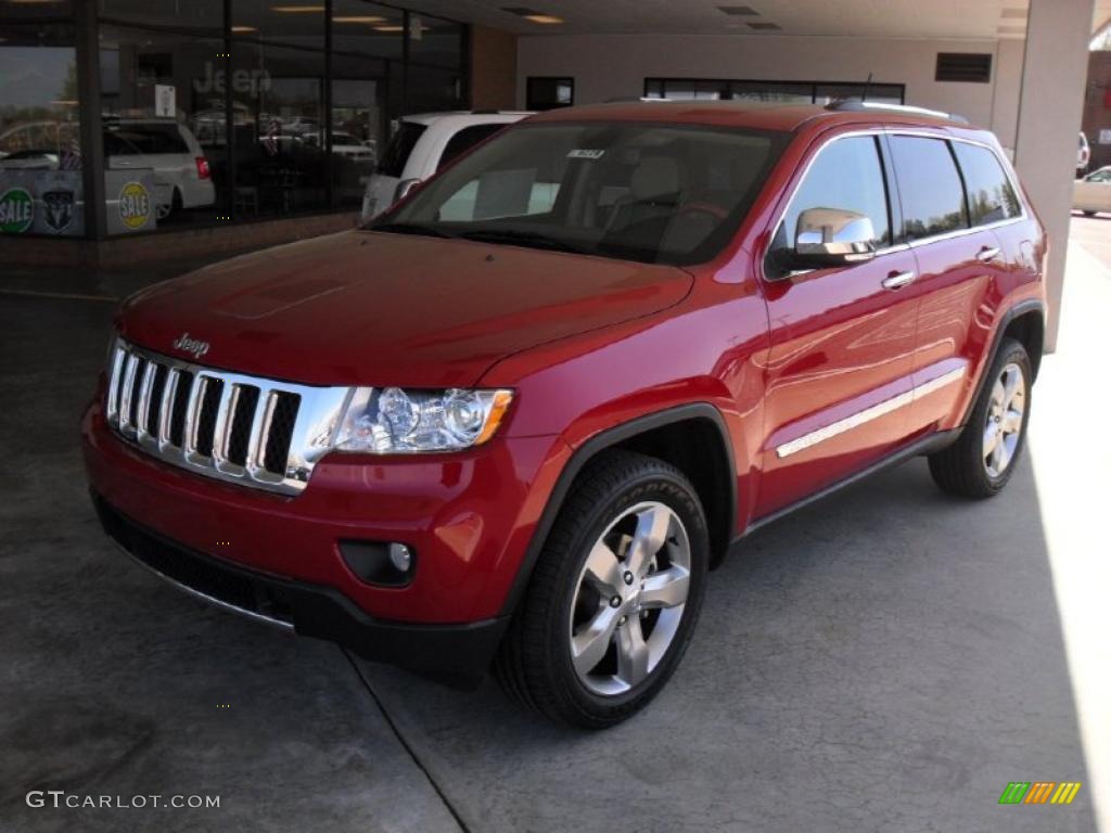 2011 Grand Cherokee Overland 4x4 - Inferno Red Crystal Pearl / Dark Frost Beige/Light Frost Beige photo #1