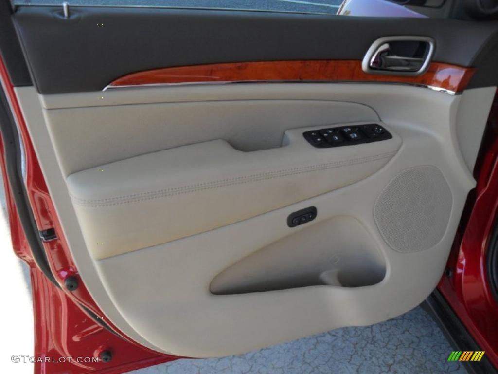 2011 Jeep Grand Cherokee Overland 4x4 Dark Frost Beige/Light Frost Beige Door Panel Photo #47218073