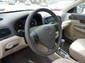 2010 Hyundai Accent Beige Interior Steering Wheel Photo