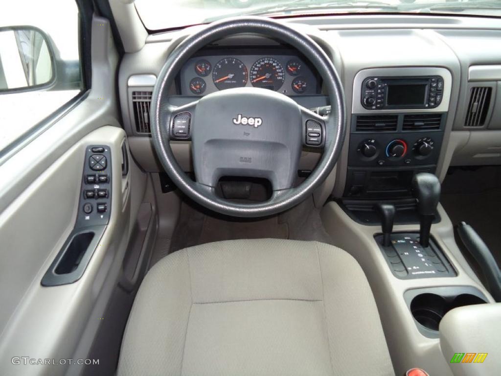 2004 Jeep Grand Cherokee Laredo 4x4 Sandstone Steering Wheel Photo #47230754