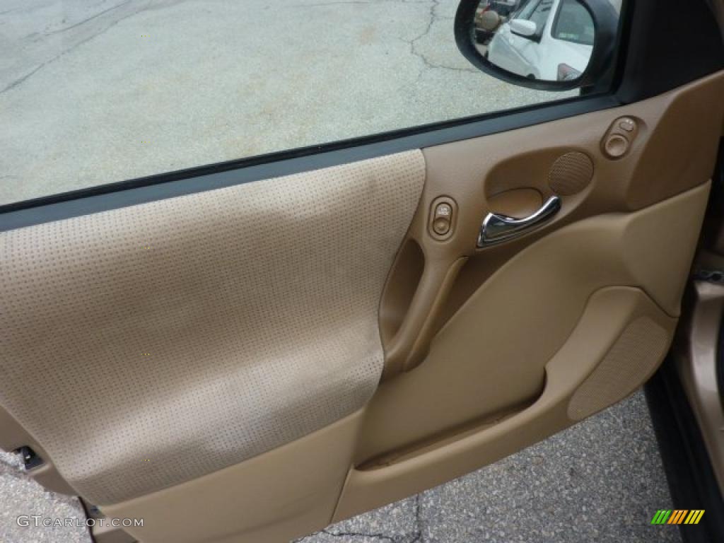 2000 Saturn L Series LS1 Sedan Medium Tan Door Panel Photo #47237894