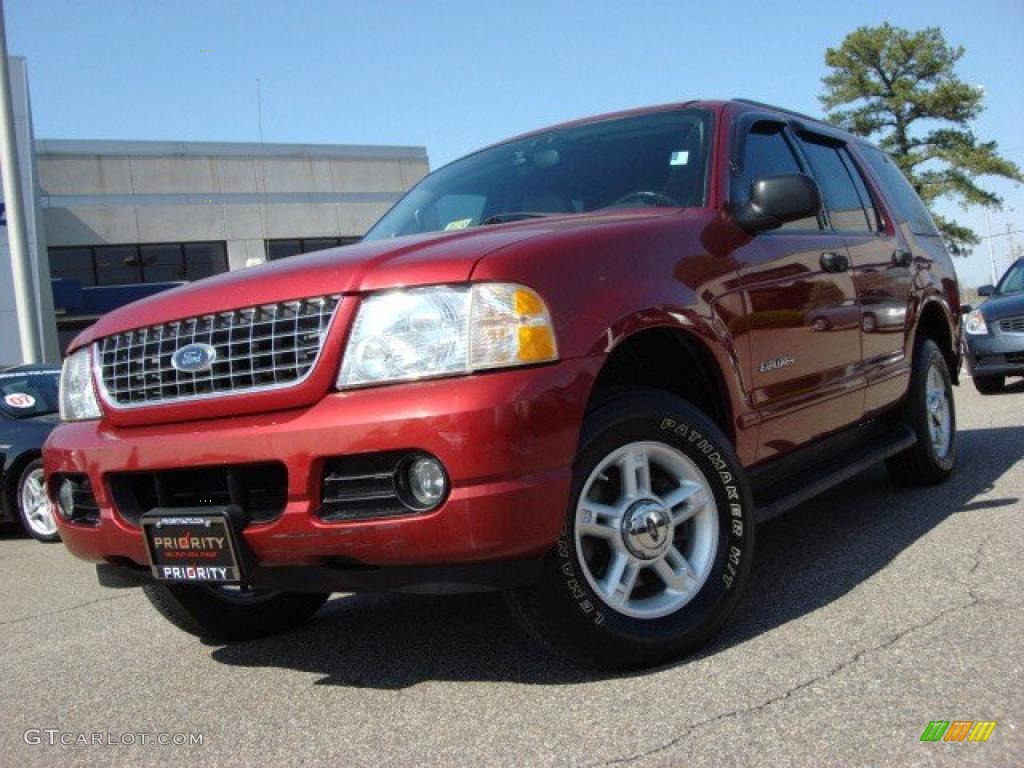 2004 Explorer XLT 4x4 - Redfire Metallic / Graphite photo #1