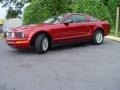 2005 Redfire Metallic Ford Mustang V6 Deluxe Coupe  photo #7