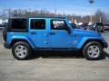 2010 Surf Blue Pearl Jeep Wrangler Unlimited Sahara 4x4  photo #4