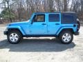 2010 Surf Blue Pearl Jeep Wrangler Unlimited Sahara 4x4  photo #8