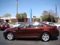 Cinnamon Red Metallic 2010 Ford Taurus SEL Exterior