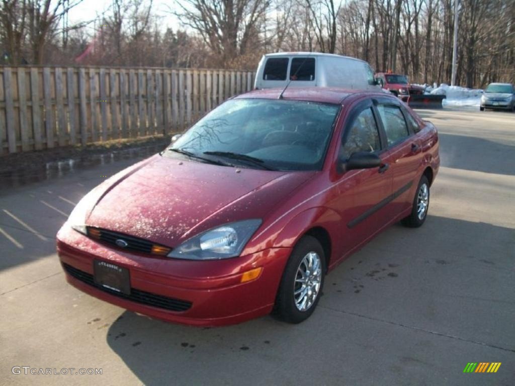 2003 Focus LX Sedan - Sangria Red Metallic / Medium Graphite photo #1
