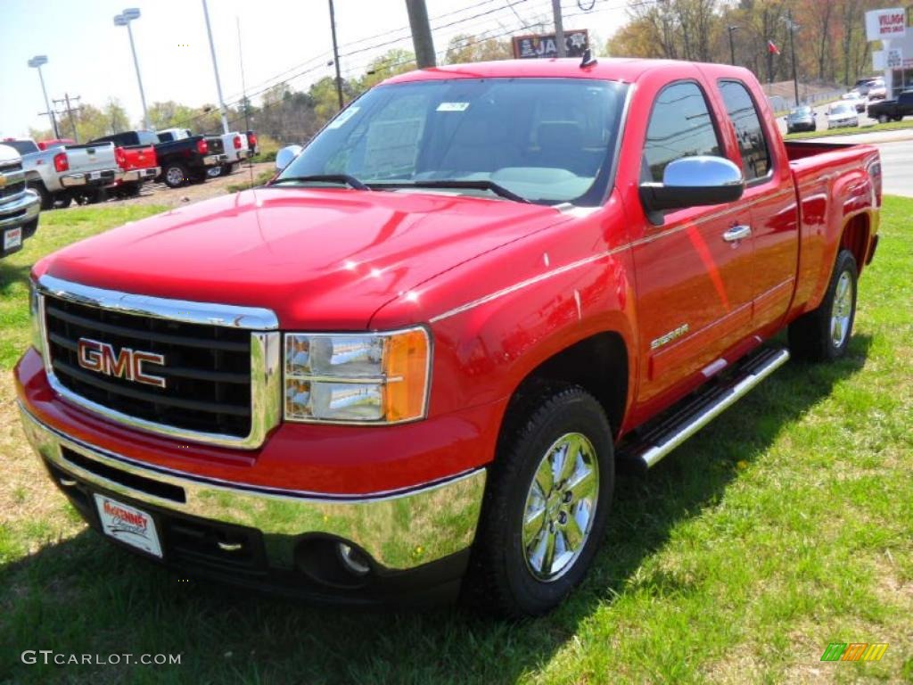 2011 Sierra 1500 SLE Extended Cab 4x4 - Fire Red / Ebony/Light Cashmere photo #1