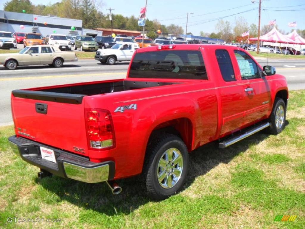 2011 Sierra 1500 SLE Extended Cab 4x4 - Fire Red / Ebony/Light Cashmere photo #6
