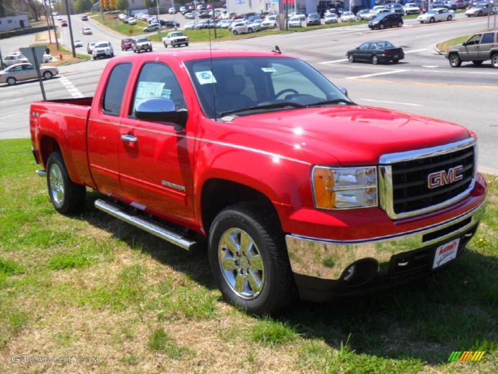 2011 Sierra 1500 SLE Extended Cab 4x4 - Fire Red / Ebony/Light Cashmere photo #7