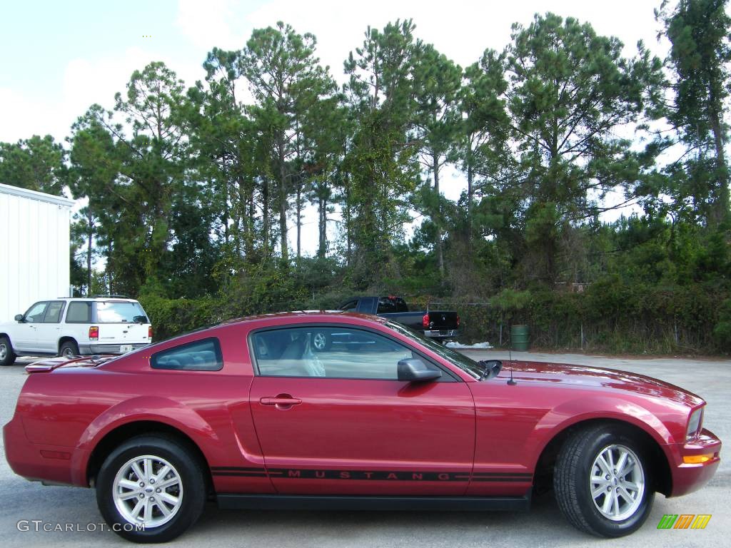 2007 Mustang V6 Deluxe Coupe - Redfire Metallic / Light Graphite photo #14