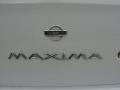 1998 Nissan Maxima GLE Badge and Logo Photo