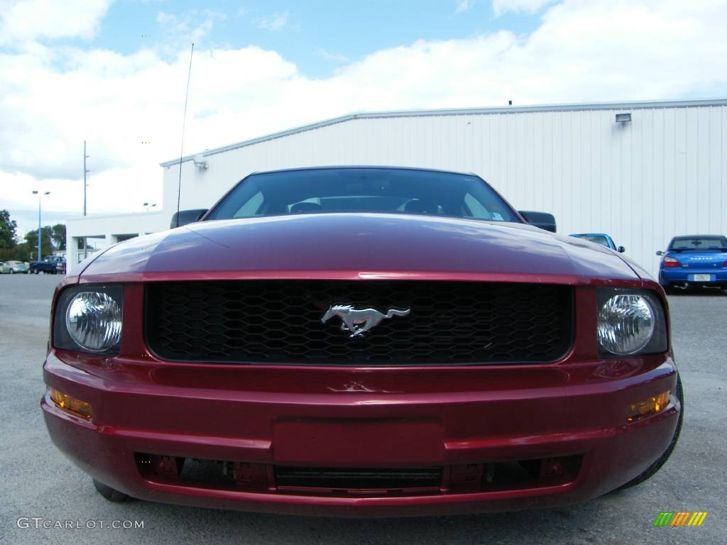 2007 Mustang V6 Deluxe Coupe - Redfire Metallic / Light Graphite photo #16