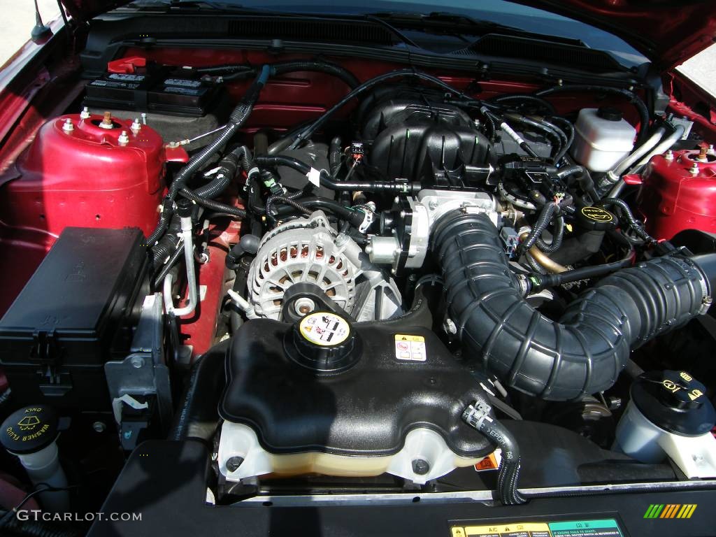 2007 Mustang V6 Deluxe Coupe - Redfire Metallic / Light Graphite photo #30